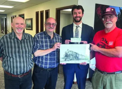 Gladstone Lions donate $500 to the Michigan Soo Line Steam Engine #730 Authority